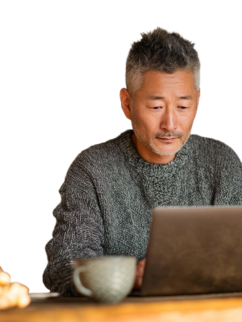 Focused Man Working on Laptop