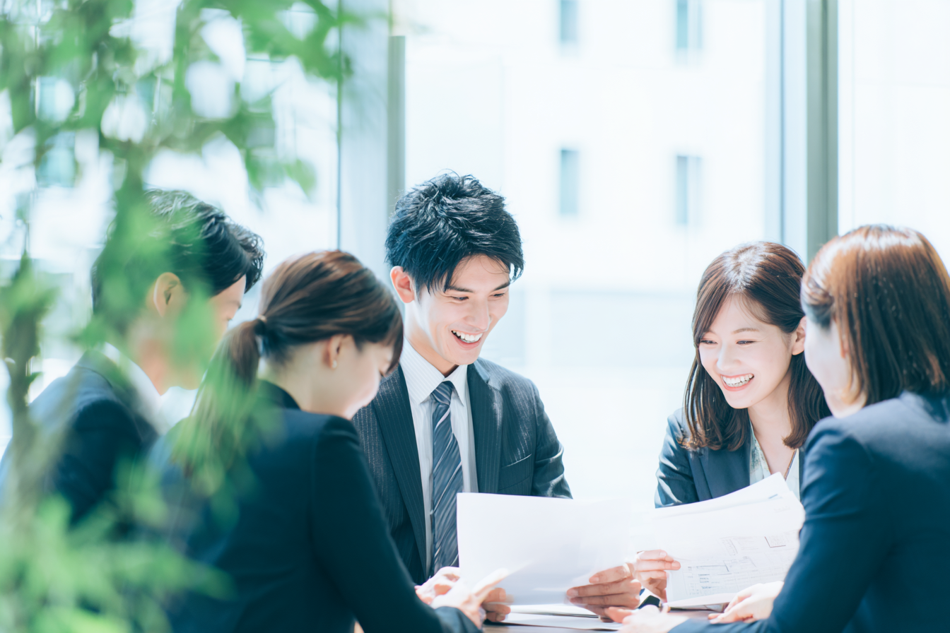 Team Meeting in Bright Office